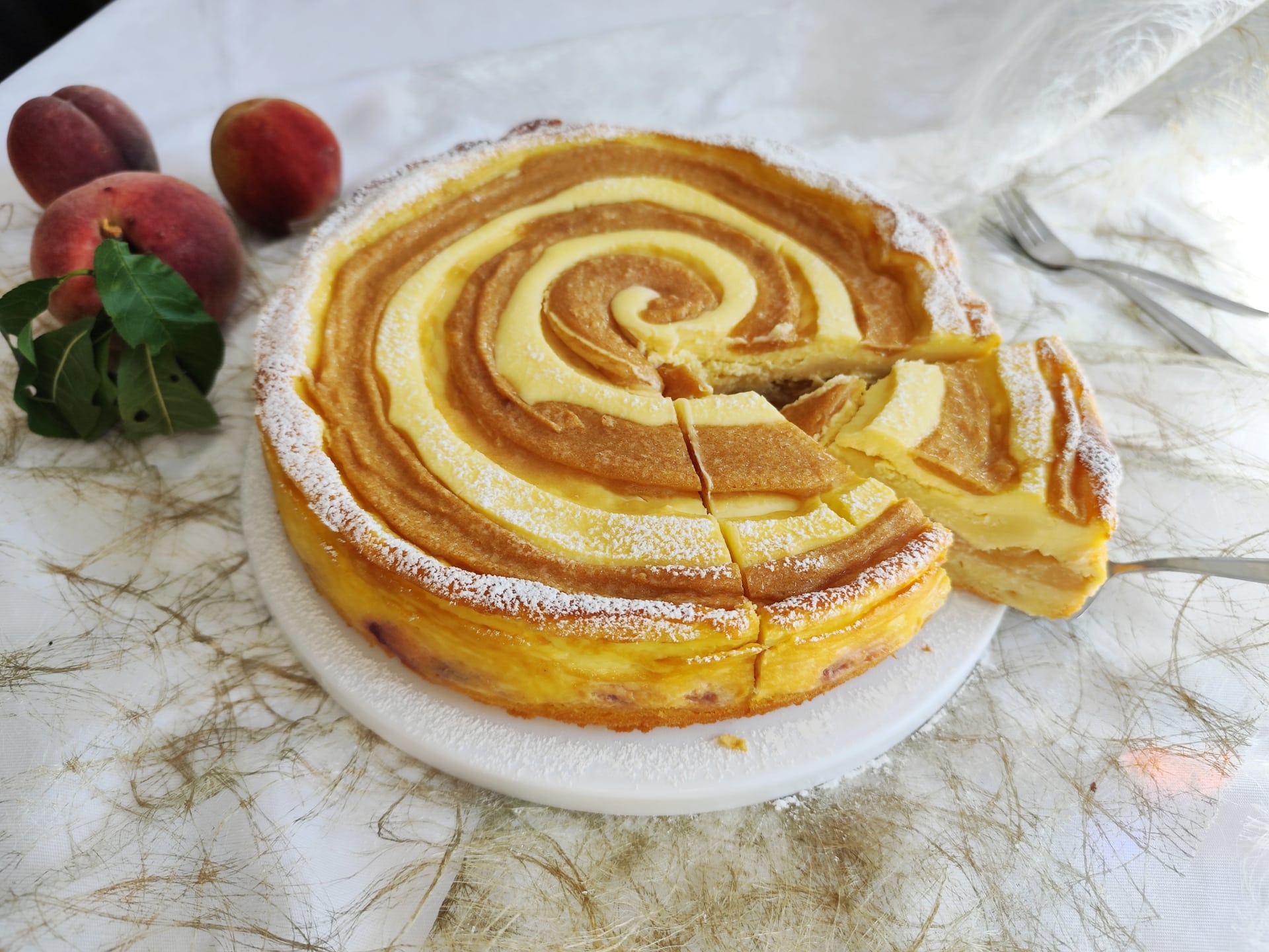 Rezept für einen cremigen Käsekuchen mit Pfirsich und Pudding